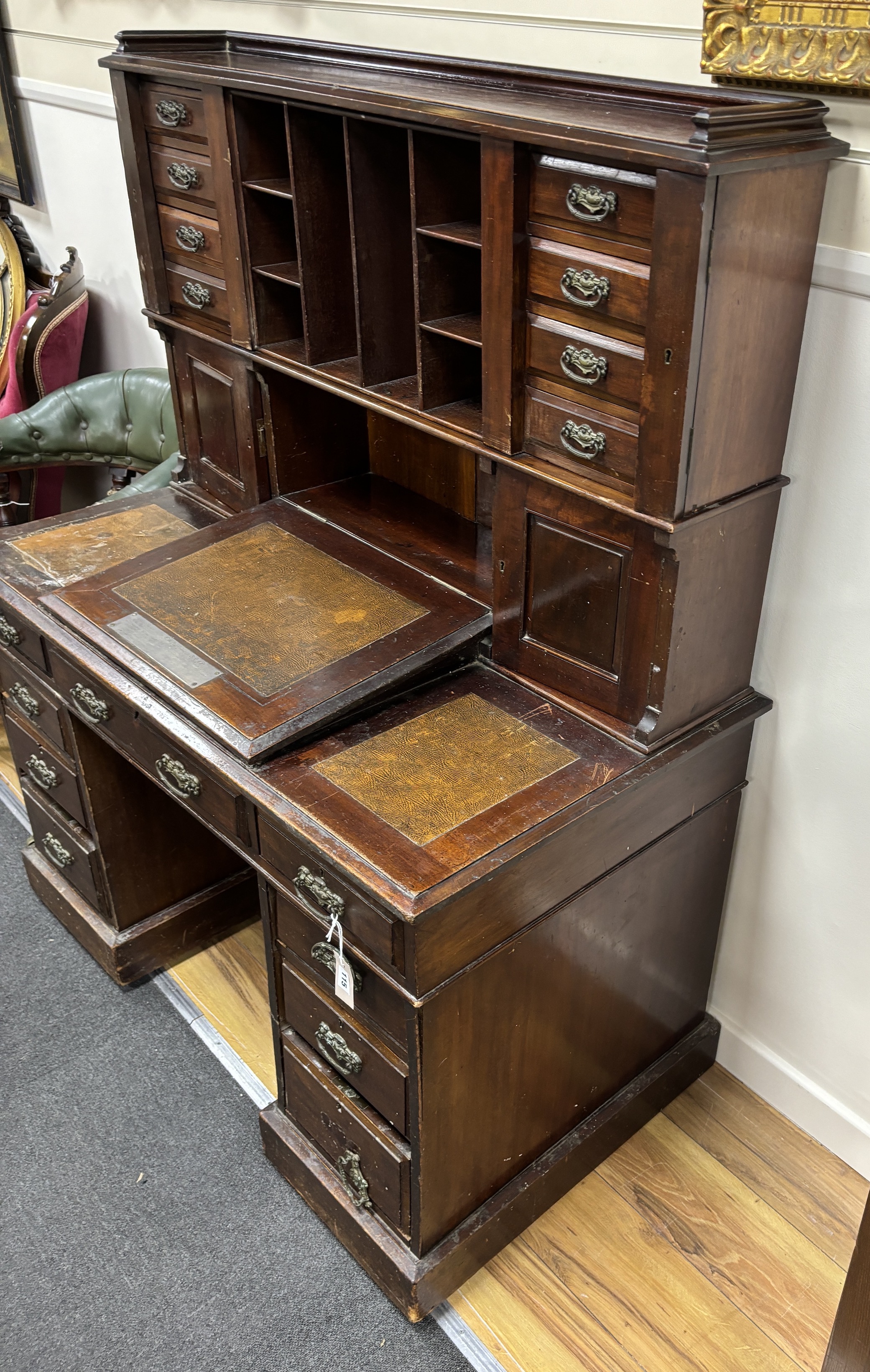 A late Victorian mahogany pedestal desk, width 118cm, depth 65cm, height 148cm, provenance Pickersgill, Labour MP and an associated late Victorian mahogany office elbow chair, provenance as above